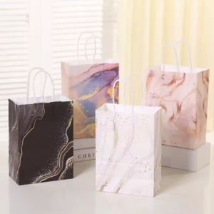 שקיות נייר עם ידית במגוון דוגמאות |5 יח'